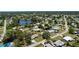 Aerial view of the neighborhood with lake at 430 Tanager Rd, Venice, FL 34293