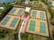 Aerial view of well-maintained pickleball and tennis courts at 12710 Sorrento Way # 101, Bradenton, FL 34211