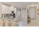 Modern kitchen with granite countertops and stainless steel appliances at 12710 Sorrento Way # 101, Bradenton, FL 34211