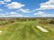 Aerial view of a lush green golf course at 12710 Sorrento Way # 101, Bradenton, FL 34211