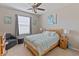 Comfortable bedroom with a queen-size bed and neutral decor at 12710 Sorrento Way # 101, Bradenton, FL 34211