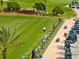 Golf driving range with multiple golfers and golf carts at 12710 Sorrento Way # 101, Bradenton, FL 34211