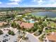 Community clubhouse with pool, tennis courts, and parking at 12710 Sorrento Way # 101, Bradenton, FL 34211