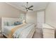 Comfortable bedroom with queen-size bed and dresser at 405 Maraviya Blvd, Nokomis, FL 34275