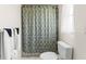 Simple bathroom with shower and a patterned curtain at 1156 Palmetto Dr, Venice, FL 34293