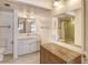 Functional bathroom featuring a single sink vanity and combined shower-tub at 19 Whispering Sands Dr # 204, Sarasota, FL 34242