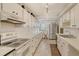 Well-maintained kitchen featuring ample counter space and stainless steel appliances at 19 Whispering Sands Dr # 204, Sarasota, FL 34242