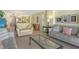 Inviting living room featuring comfortable seating, natural light, and stylish decor at 19 Whispering Sands Dr # 204, Sarasota, FL 34242