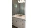 Bathroom with vanity, quartz countertop, and a large walk-in shower at 4819 Higel Rd, Sarasota, FL 34242