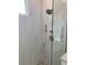 Walk-in shower with patterned floor and modern fixtures at 4819 Higel Rd, Sarasota, FL 34242