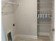 Bright laundry area provides ample storage and organization at 4865 Manila Ave, North Port, FL 34288