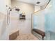 Large walk-in shower with built-in seating at 17812 Doe Creek Ct, Parrish, FL 34219