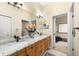 Elegant bathroom with granite countertops and double sinks at 17812 Doe Creek Ct, Parrish, FL 34219