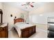 Bedroom with a large bed, and a white board at 17812 Doe Creek Ct, Parrish, FL 34219