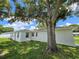 Rear view of a freshly painted house, showcasing its clean lines at 100 N Duncan Ave, Clearwater, FL 33755