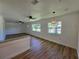 Open concept living room with hardwood floors and natural light at 100 N Duncan Ave, Clearwater, FL 33755