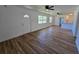 Spacious living area featuring hardwood floors and an open layout at 100 N Duncan Ave, Clearwater, FL 33755