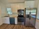 Updated kitchen, featuring stainless steel appliances and granite countertops at 100 N Duncan Ave, Clearwater, FL 33755
