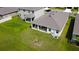 Aerial view showing house, backyard, and patio at 10827 Charlotte Dr, Parrish, FL 34219