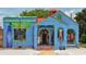 Bright blue storefront with rentals and retail at 19 Whispering Sands Dr # 204, Sarasota, FL 34242