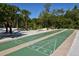 Enjoy a friendly game on the community shuffleboard courts at 19 Whispering Sands Dr # 204, Sarasota, FL 34242