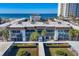 Oceanfront building with balconies and walkways at 2100 Benjamin Franklin Dr # 105, Sarasota, FL 34236
