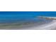 White sand beach and ocean waves at 2100 Benjamin Franklin Dr # 105, Sarasota, FL 34236