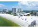 Aerial view of Lido Harbour South, showing the community's location on the beach and nearby high-rises at 2100 Benjamin Franklin Dr # 105, Sarasota, FL 34236