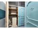 Private storage unit with shelving and dresser at 2100 Benjamin Franklin Dr # 105, Sarasota, FL 34236