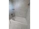 Renovated bathroom with modern bathtub and stylish tile at 4819 Higel Rd, Sarasota, FL 34242