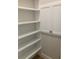 Bright, spacious pantry with ample shelving for storage at 4819 Higel Rd, Sarasota, FL 34242