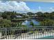 Stunning waterfront view with lush landscaping and canal access at 4819 Higel Rd, Sarasota, FL 34242