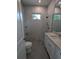 Clean bathroom with a walk-in shower and pebble floor at 4819 Higel Rd, Sarasota, FL 34242