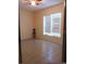 Bright bedroom with tile flooring, window coverings, and ceiling fan at 2607 River Preserve Ct # 2607, Bradenton, FL 34208