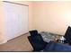 Bedroom with closet, workspace and tile flooring at 2607 River Preserve Ct # 2607, Bradenton, FL 34208