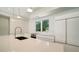 Modern kitchen with white cabinets and high-end appliances at 2231 Wood St, Sarasota, FL 34237