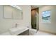 Clean bathroom with modern vanity and shower at 2231 Wood St, Sarasota, FL 34237