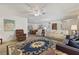 Bright living room featuring comfortable seating and decorative rug at 780 Tarawitt Dr, Longboat Key, FL 34228
