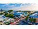 Coastal town with colorful buildings and ocean views at 780 Tarawitt Dr, Longboat Key, FL 34228