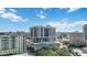 Aerial daytime view of condo building featuring cityscape views and lush surroundings at 50 Central Ave # 17Phb, Sarasota, FL 34236