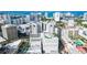 Panoramic aerial shot of the building and neighborhood offering beautiful cityscape and ocean views at 50 Central Ave # 17Phb, Sarasota, FL 34236