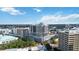 Aerial daytime view of condo building with surrounding cityscape and vibrant community at 50 Central Ave # 17Phb, Sarasota, FL 34236