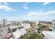 Expansive aerial view showcasing the city skyline, waterfront, and blue skies, highlighting the desirable urban location at 50 Central Ave # 17Phb, Sarasota, FL 34236