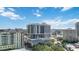 Aerial view of a luxury high-rise building complex on a sunny day at 50 Central Ave # 17Phb, Sarasota, FL 34236