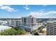 Aerial daytime view of the condo building and city showcasing the vibrant cityscape and lush surroundings at 50 Central Ave # 17Phb, Sarasota, FL 34236