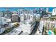 Capture the beauty of this aerial view of the city buildings complete with a rooftop pool and scenic views at 50 Central Ave # 17Phb, Sarasota, FL 34236