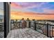 Spacious balcony with geometric railings offers stunning city views with an amazing sunset at 50 Central Ave # 17Phb, Sarasota, FL 34236