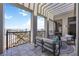 Relaxing balcony with comfortable seating and a beautiful city view at 50 Central Ave # 17Phb, Sarasota, FL 34236