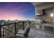 Cozy balcony with an outdoor kitchen featuring a grill and stunning city skyline view at 50 Central Ave # 17Phb, Sarasota, FL 34236