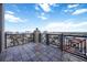 Spacious balcony offers scenic views and decorative iron railing at 50 Central Ave # 17Phb, Sarasota, FL 34236
